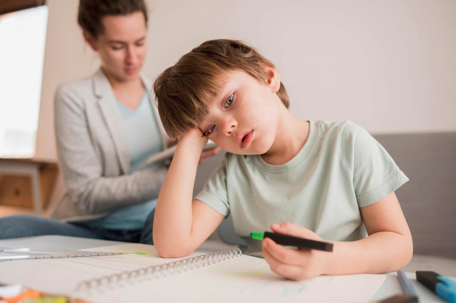 child-bored-home-while-being-tutored impacted by adhd